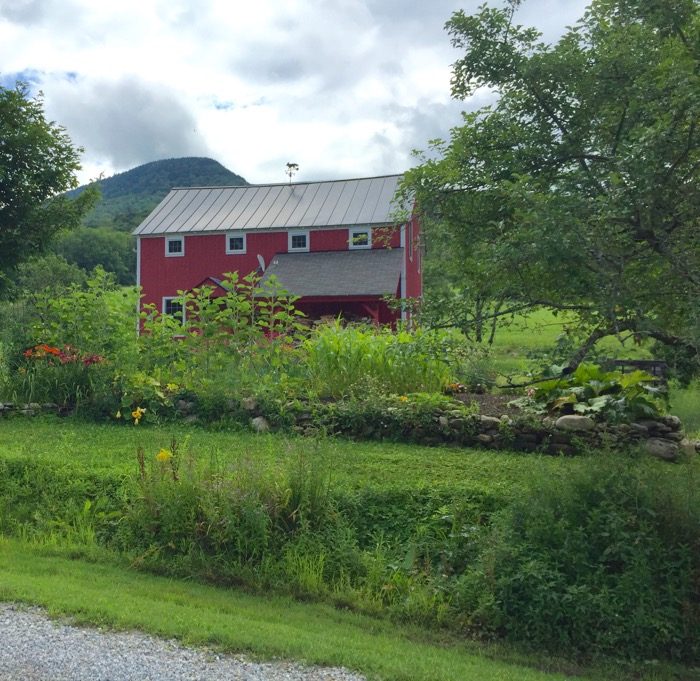 Barn with flowers Dorset Vermont photo by Kathy Miller