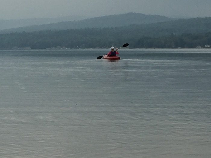 Janet kyaking on Seymour Lake photo by Kathy Miller