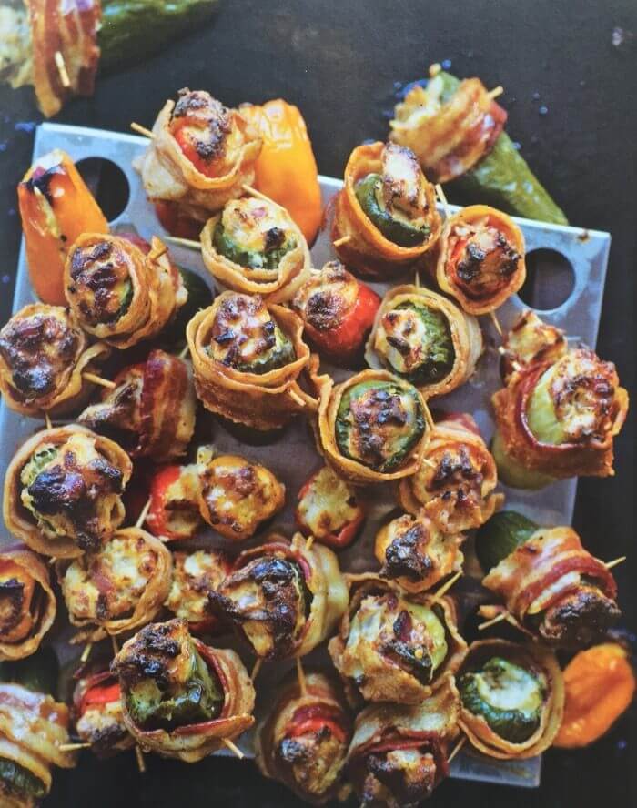Bacon-Wrapped Jalapeno Duck Poppers courtesy Cookin' It With Kix: The Art Of Celebrating And The Fun Of Outdoor Cooking