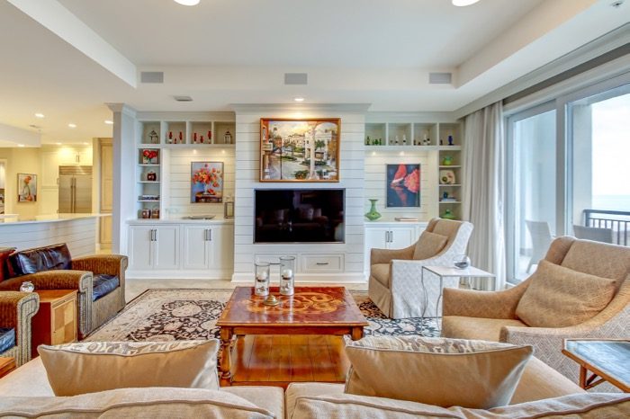 Spyglass Living with artwork displayed on shiplap walls