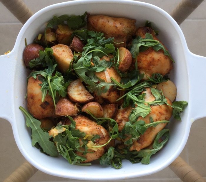 Roasted Chicken Thigh with Potatoes and Arugula photo by Kathy Miller