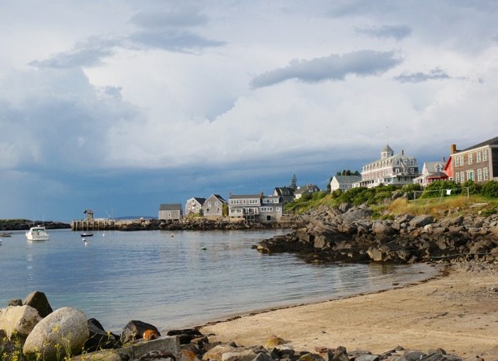 Mongehan Island Harbor with view of ferry dock, Island Inn and swimming beach photo by Kathy Miller