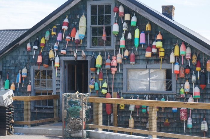 The buoy wall beside Thurston's Lobster Pound photo by Kathy Miller