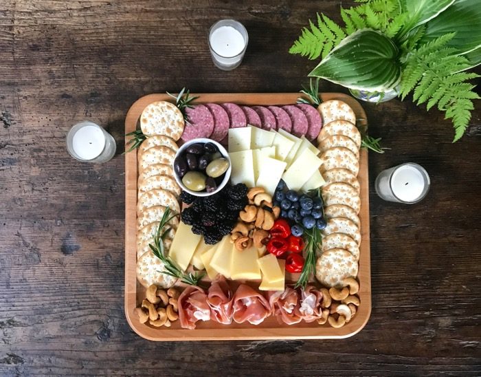 Cheese Board for the 4th of July on antique table photo by Kathy Miller