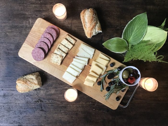 Simpler cheese board on Vermont cutting board photo by Kathy Miller