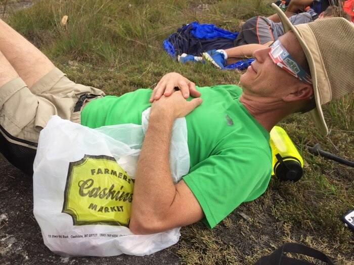 Dave with his eclipse glasses on ....and the farmers market bag with our lunch photo by Kathy Miller