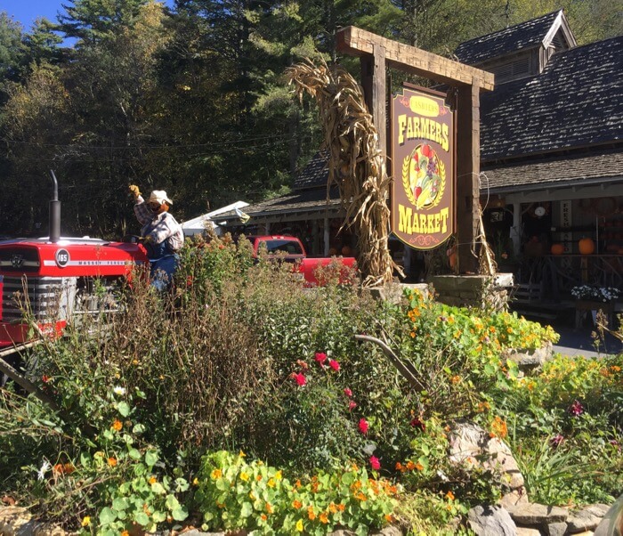 Cashiers Farmers Market with tractor during fall leaf season photo by Kathy Miller