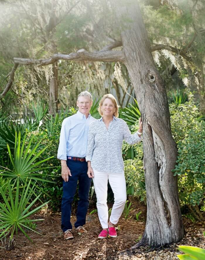 Doug and Amy Wilsterman with favorite cedar tree photo by Susan Scarborouigh