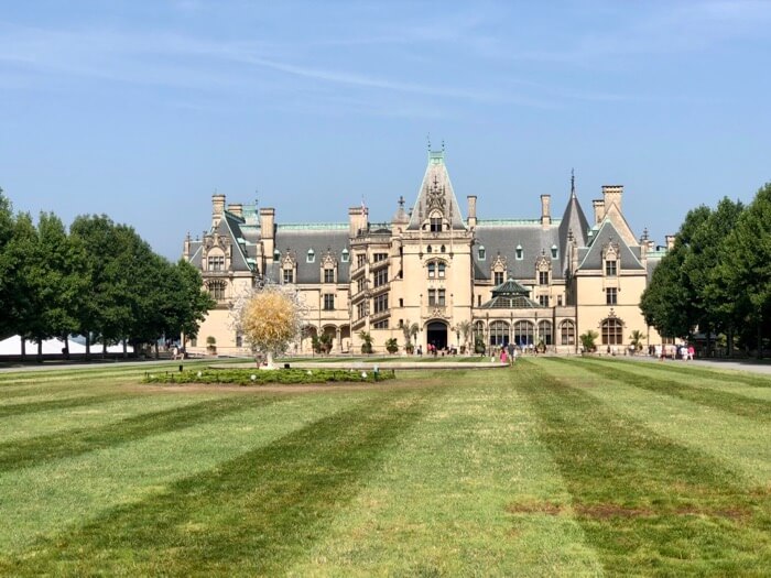 Biltmore Estate, Asheville, NC the house! with Chihuly Sculpture anchoring the front lawn photo by Kathy Miller