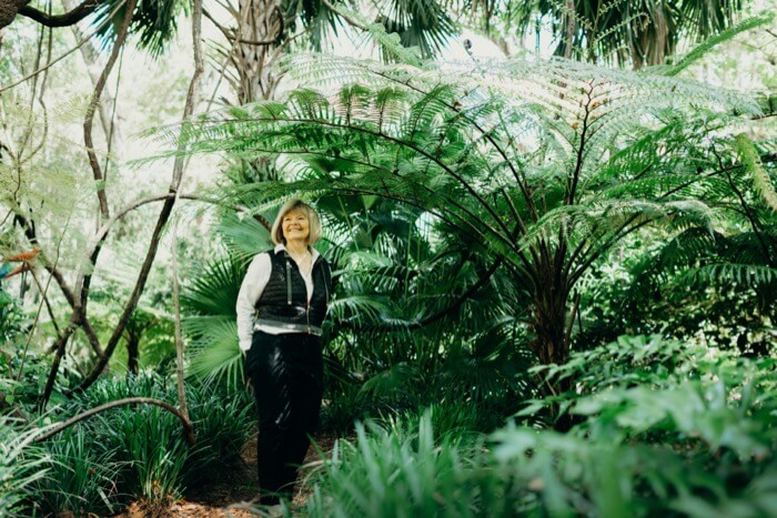 Becky Grimes under her Australian Tree Fern