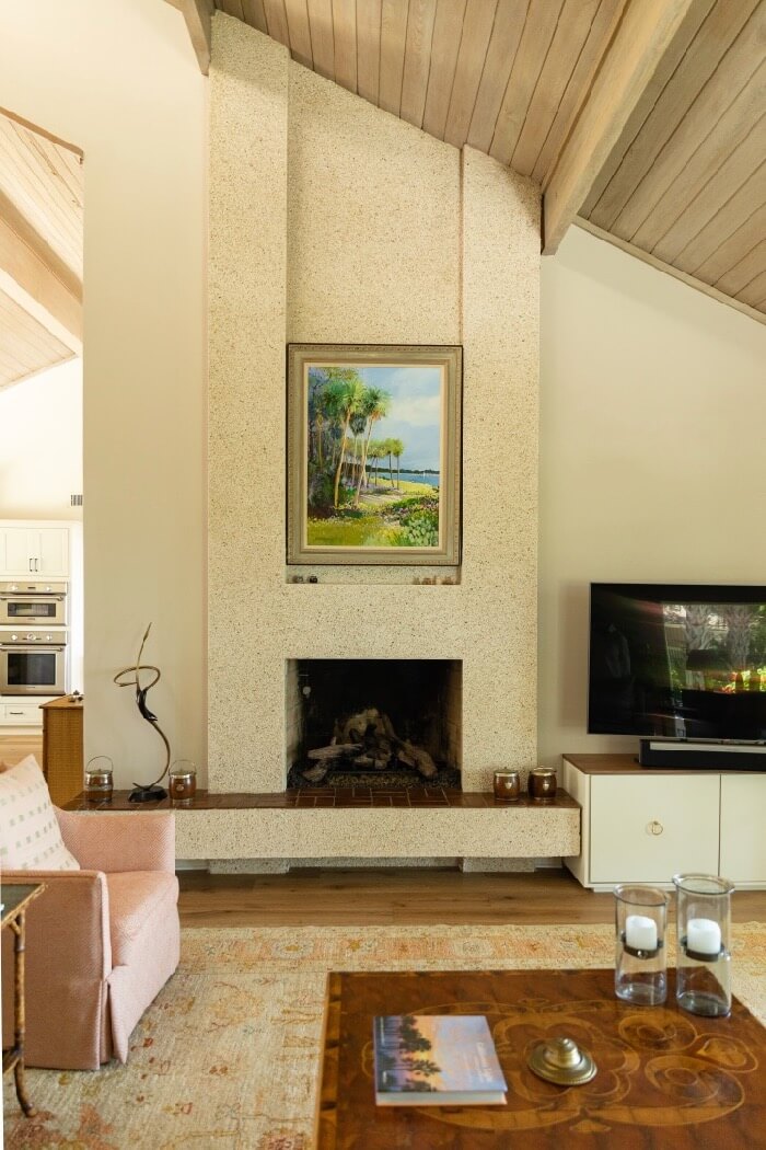 Coquina fireplace original to the house photo by Lynn Tennille