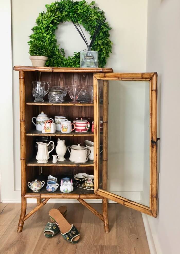 antique bamboo cabinet with sugar and creamer collection photo by Kathy Miller