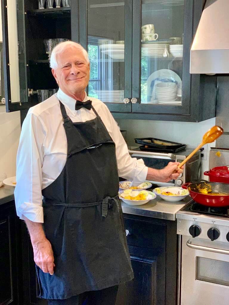 Morris Marx stirring his bouillabaisse soup photo by Barbara Hopkins