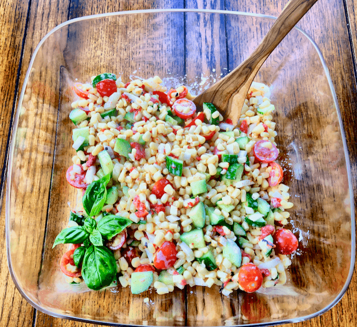 Corn, cucumber and tomato salad