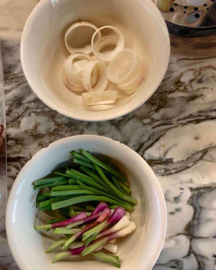 Beautiful specialty onions and leeks photo by Kathy Miller