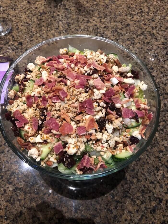 salad with bacon, cherries and gorgonzola layers then tossed