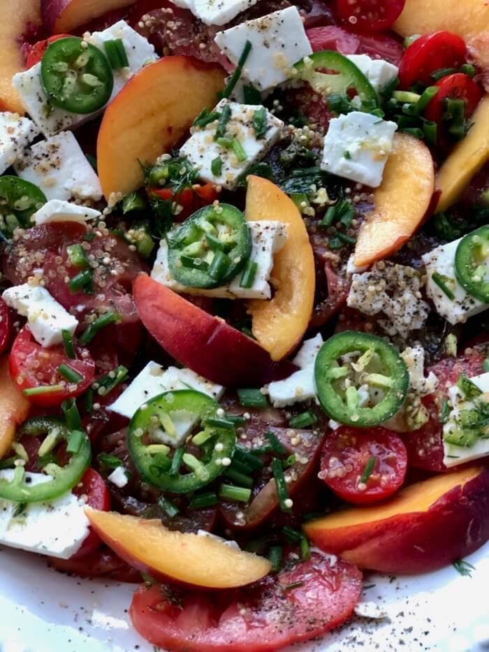 Summer tomato alad with peaches, jalapenos and feta photo by Kathy Miller