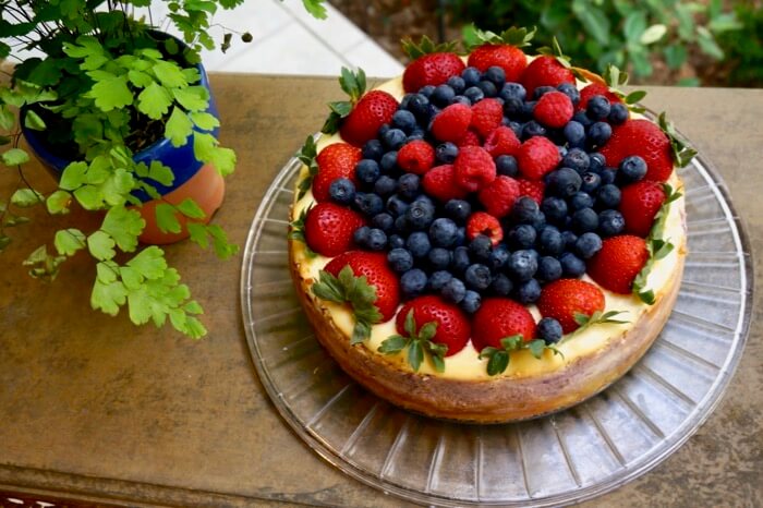 Cheesecake with blueberries, raspberries and strawberries